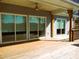 Large back porch with beautiful wooded columns and a lake view at 1120 Cedar St, Mount Holly, NC 28120