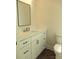 Bathroom featuring white vanity with countertop and chrome faucet at 1120 Cedar St, Mount Holly, NC 28120