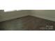 Bedroom featuring hardwood floors and white trim at 1120 Cedar St, Mount Holly, NC 28120