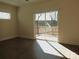 Bedroom with sliding glass door and deck overlooking lake at 1120 Cedar St, Mount Holly, NC 28120