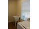 Functional laundry area with a sink, washer, and dryer, providing practicality and convenience at 1120 Cedar St, Mount Holly, NC 28120