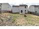 Fenced backyard featuring a patio, space for outdoor activities, and potential for landscaping at 1128 Tangle Ridge Se Dr, Concord, NC 28025