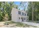 Traditional two story home with mature trees and a long drive way at 114 I K Beatty St, Charlotte, NC 28214