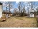 Backyard with deck, storage shed and fire pit at 1140 Roberts St, China Grove, NC 28023