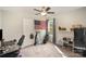 Functional bedroom with a desk, golf clubs, and shelving units for versatile use at 1140 Roberts St, China Grove, NC 28023