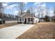 Charming home with front yard and long driveway to the side at 1140 Roberts St, China Grove, NC 28023