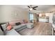Open-concept living space with a sectional, dining area, and kitchen, perfect for modern living at 1140 Roberts St, China Grove, NC 28023