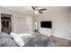 Bright and airy main bedroom with a closet and white dresser and television at 1140 Roberts St, China Grove, NC 28023