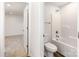 Bright bathroom with a shower-tub combination and modern fixtures at 118 I K Beatty St, Charlotte, NC 28214