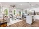 Inviting living space with large windows, hardwood floors, and seamless flow into the dining area at 118 I K Beatty St, Charlotte, NC 28214