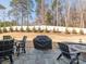 Spacious backyard patio with grill and fire pit at 14543 Crosswater Ln, Charlotte, NC 28278