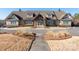 Community clubhouse with stone accents and landscaping at 14543 Crosswater Ln, Charlotte, NC 28278