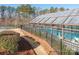Enclosed community pool with a glass roof at 14543 Crosswater Ln, Charlotte, NC 28278