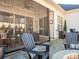 Relaxing screened porch with patio furniture and outdoor lighting at 14543 Crosswater Ln, Charlotte, NC 28278