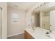 Bathroom with wood vanity, a large mirror, and a shower/tub combo at 1614 Hardy Dr, Rock Hill, SC 29732