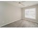 Bedroom with gray vinyl flooring and a ceiling fan at 1614 Hardy Dr, Rock Hill, SC 29732