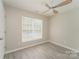 Bedroom with gray vinyl flooring and a ceiling fan at 1614 Hardy Dr, Rock Hill, SC 29732