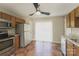 Kitchen with wood cabinets, stainless steel appliances, and tiled floor at 1614 Hardy Dr, Rock Hill, SC 29732