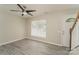 Bright living room with gray vinyl flooring and a ceiling fan at 1614 Hardy Dr, Rock Hill, SC 29732