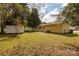 Backyard with shed and spacious grassy area at 1704 Rice Planters Rd, Charlotte, NC 28273