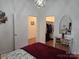 Cozy bedroom with closet and bathroom access at 2510 Lentz Rd, China Grove, NC 28023