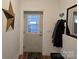 A lovely entryway features a starburst decoration and a frosted glass door to the outside at 2510 Lentz Rd, China Grove, NC 28023