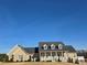 Charming brick home with welcoming front porch and well-manicured lawn at 2510 Lentz Rd, China Grove, NC 28023