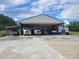 Spacious metal outbuilding with a concrete floor, perfect for equipment storage at 2510 Lentz Rd, China Grove, NC 28023