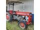 Classic red Massey Ferguson 135 tractor, a reliable workhorse for any property at 2510 Lentz Rd, China Grove, NC 28023
