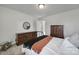 Comfortable bedroom with carpet flooring, neutral walls, and wooden dressers at 343 Embers Ln, Clover, SC 29710