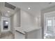 Upstairs hallway features neutral paint, carpet flooring and leads to the bedrooms and laundry room at 343 Embers Ln, Clover, SC 29710