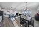 Bright open concept floorplan connecting the kitchen, dining area, and living room at 343 Embers Ln, Clover, SC 29710