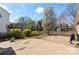 Home's backyard has a patio, landscaping and basketball hoop for outdoor enjoyment at 3507 Southern Ginger Dr, Indian Trail, NC 28079