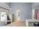 Spacious bedroom with loft bed, desk, and ample storage space with neutral carpet at 3507 Southern Ginger Dr, Indian Trail, NC 28079