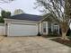 One-story home boasting a spacious two-car garage and manicured landscaping at 3507 Southern Ginger Dr, Indian Trail, NC 28079