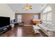 Spacious living room with hardwood floors, vaulted ceiling, and a comfortable seating area at 3507 Southern Ginger Dr, Indian Trail, NC 28079