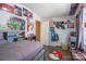 Nicely appointed bedroom featuring a gray wood bed frame and hardwood style floors at 3765 Killian Rd, Lincolnton, NC 28092