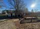 Back of house with deck and partial view of yard at 518 Glenn St, Chester, SC 29706