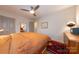 This cozy bedroom features a ceiling fan, warm lighting, and minimalist decor at 544 Wakefield Dr, Charlotte, NC 28209