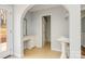 Bathroom with vanity, sink, toilet, and access to backyard deck at 622 Oakdale Dr, Statesville, NC 28677