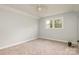 A carpeted bedroom with natural light at 622 Oakdale Dr, Statesville, NC 28677