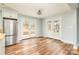 Bright dining area with stainless refrigerator and double french doors leading to outdoor space at 622 Oakdale Dr, Statesville, NC 28677