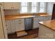 Spacious kitchen with stainless steel appliances, custom countertops, and ample storage at 622 Oakdale Dr, Statesville, NC 28677