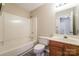 Clean bathroom with bathtub, toilet and wood vanity at 637 Tysons Forest Dr, Rock Hill, SC 29732