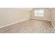 Bright bedroom with new flooring and large windows at 637 Tysons Forest Dr, Rock Hill, SC 29732