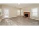 Bright living room with hardwood floors and fireplace at 637 Tysons Forest Dr, Rock Hill, SC 29732