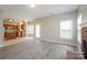 Living room features hardwood floors and a brick fireplace at 637 Tysons Forest Dr, Rock Hill, SC 29732
