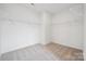Spacious walk-in closet with shelving, offering ample storage in a modern design at 7120 Wayfarer Dr # 0079, Charlotte, NC 28269