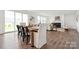 Elegant dining room connects to the living room, featuring ample seating, and modern design at 7120 Wayfarer Dr # 0079, Charlotte, NC 28269