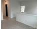 Upstairs hallway showing an open floor plan and access to multiple rooms at 7120 Wayfarer Dr # 0079, Charlotte, NC 28269